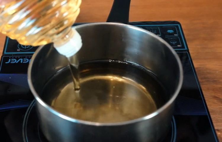 Heat oil for cooking