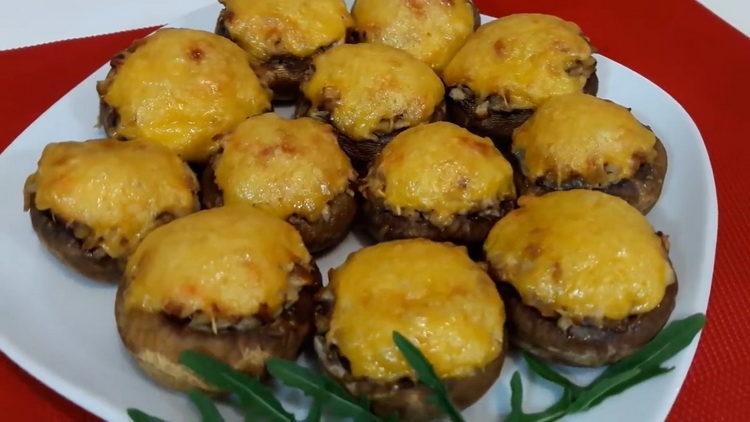 Oven baked stuffed mushrooms with cheese and chicken, baked in the oven