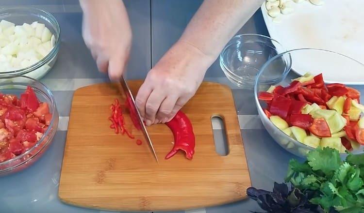 cut sweet and hot peppers.