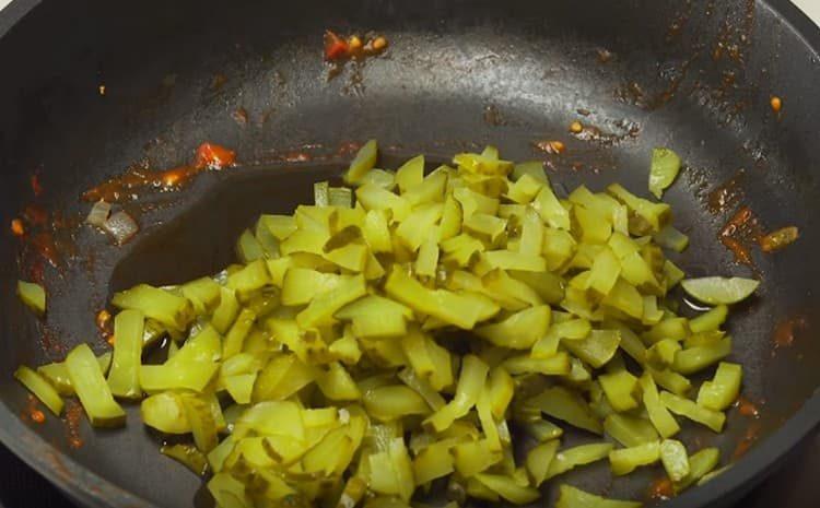 Cut pickles and fry.