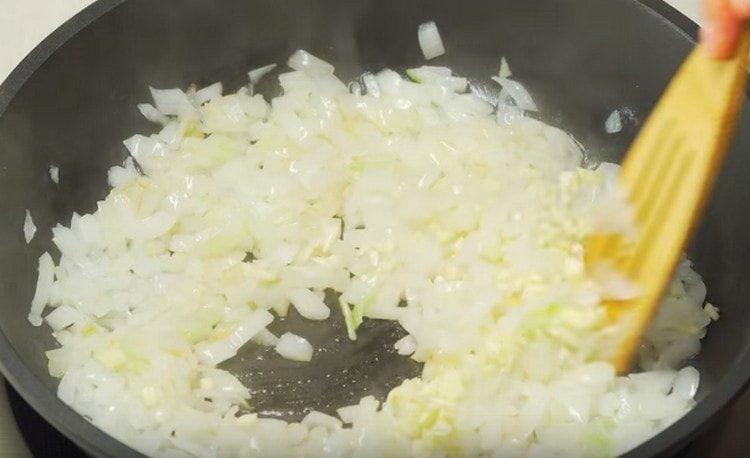 Add garlic to the onion.