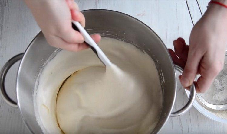 Gently mix the dough.