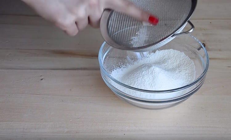 First, sift the flour with starch.