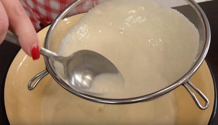 Pass the dough through a sieve.