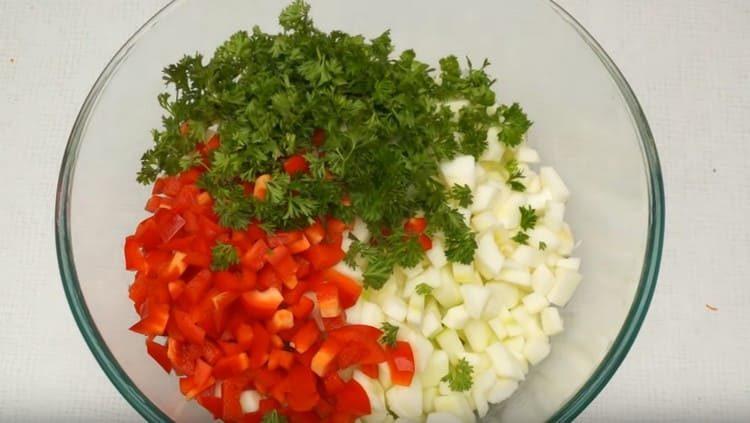 Add sweet pepper and greens to the zucchini.