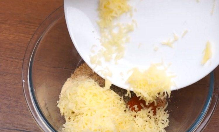 Cooking cheese breading for zucchini.