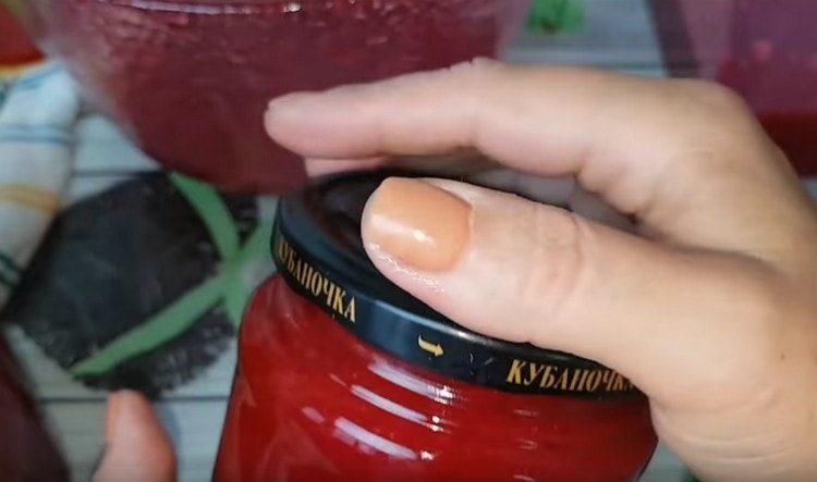 Pour jam into sterilized jars and twist the lids.