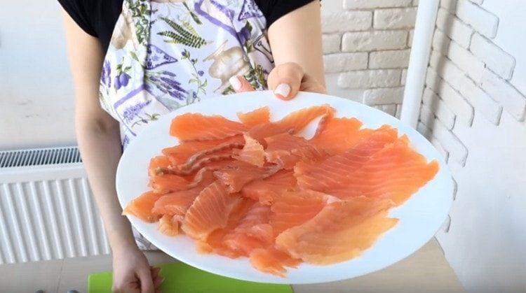 cut red fish into thin slices.