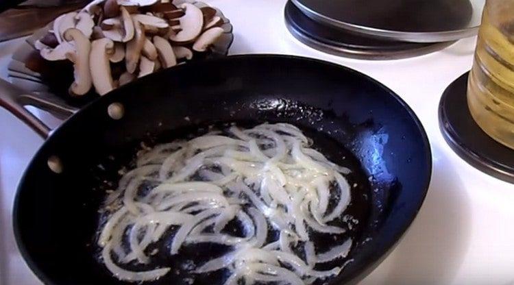 First fry the onions.