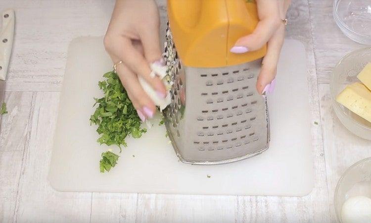 Grind greens, grate boiled eggs.