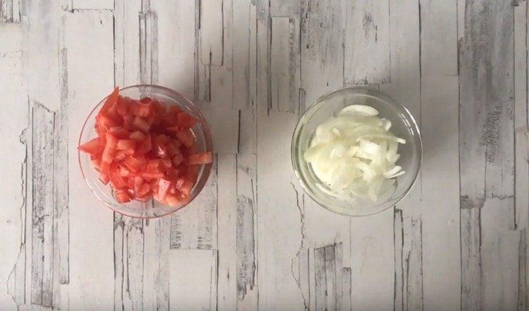 Finely chop the tomato and onion.