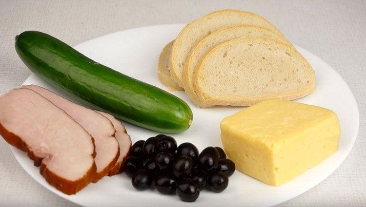 we need olives, ham, cheese, bread and cucumber.
