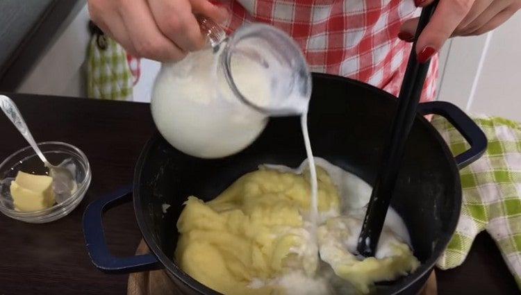 Add hot milk.