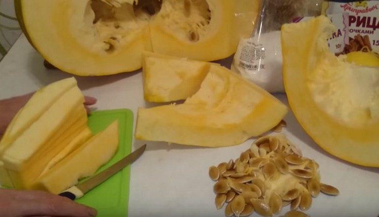 We clean the pumpkin from seeds and peel.