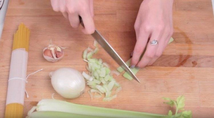 Finely chop celery.