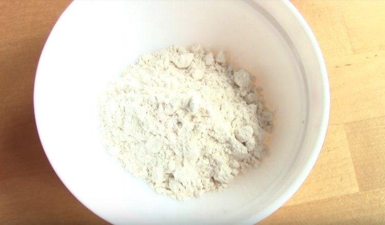 Prepare flour for breadcrumbs.