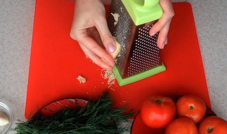 grate cheese on a fine grater.