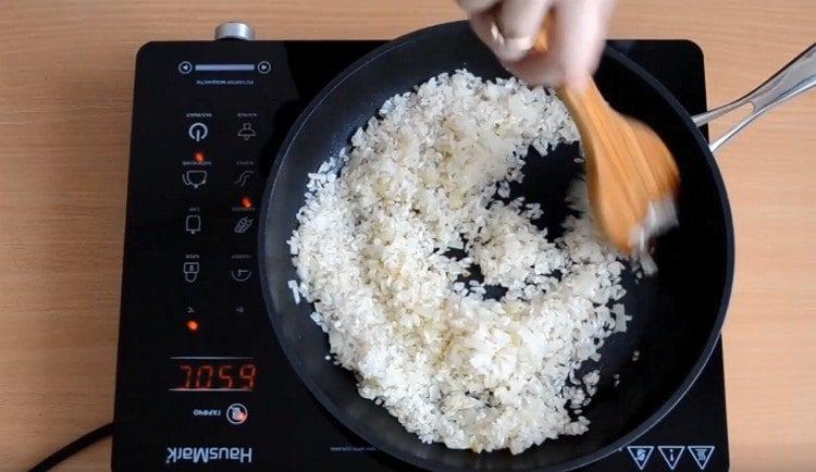 Stir fried rice with onions.