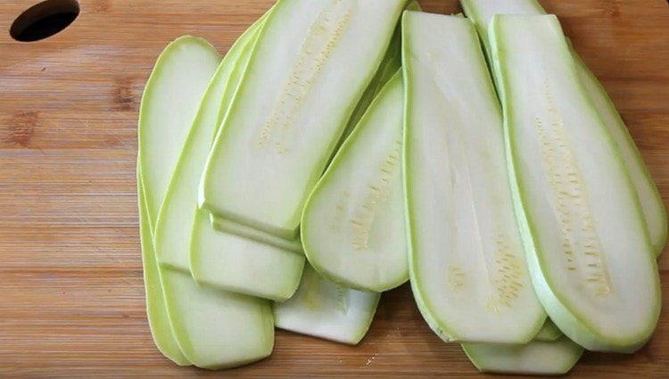 Cut into slices of zucchini.