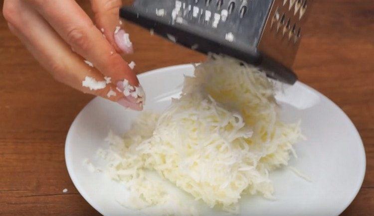 Rub the egg whites on a fine grater.