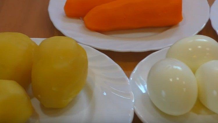 Boil potatoes, carrots and eggs.
