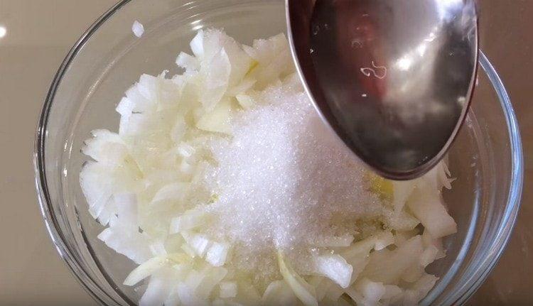 Grind onion and pickle it with vinegar and sugar.