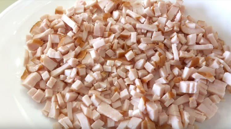 Smoked breast cut into cubes and spread on a dish.