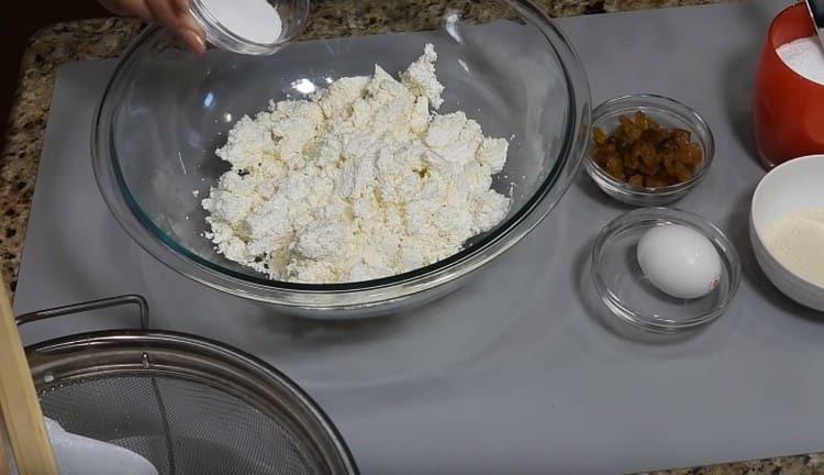 Add salt and sugar to the curd.