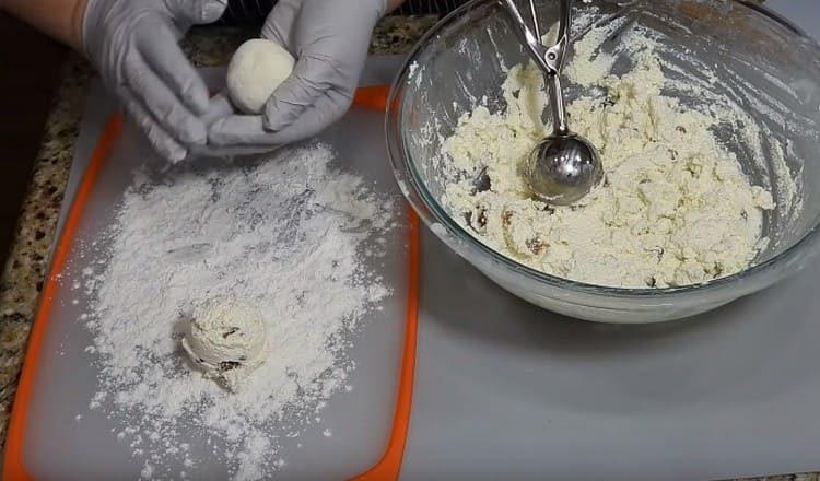 Roll each ball in flour.