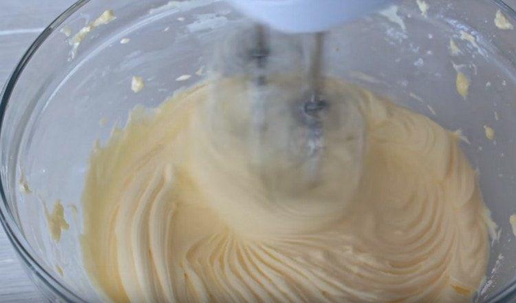 Beat soft butter, cream cheese with a mixer.