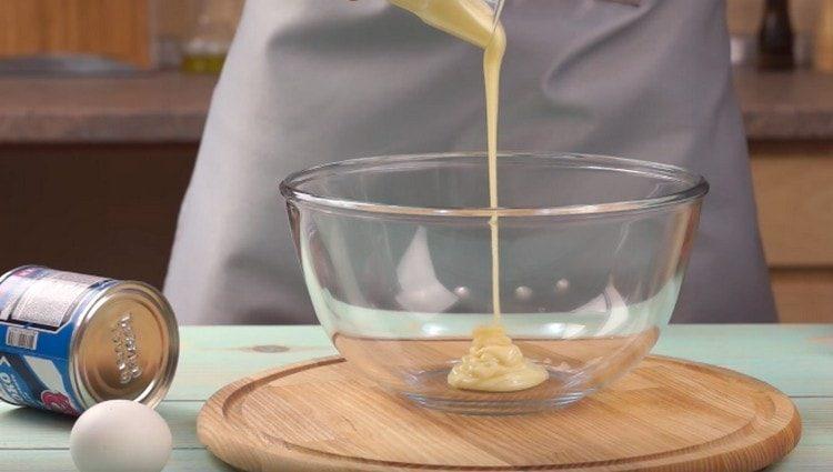 pour condensed milk into a bowl.