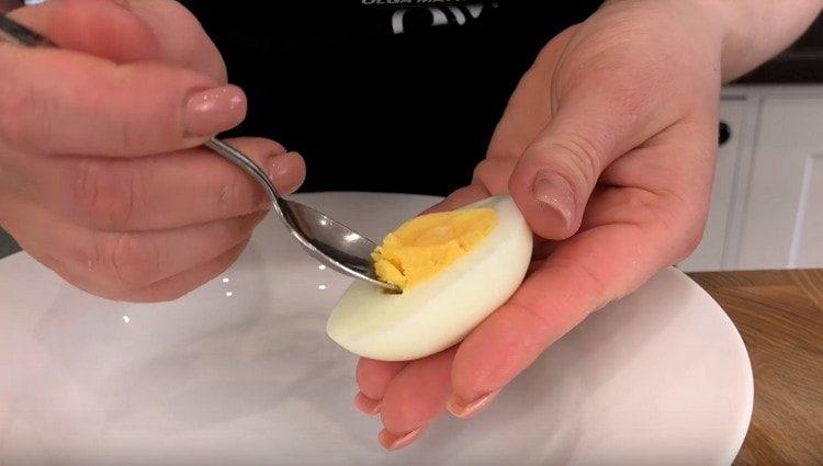 cut the eggs in half and gently take out the yolk.