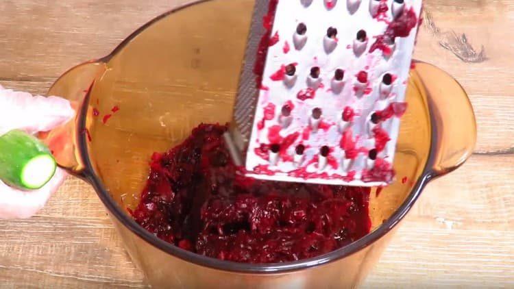 Three boiled beets on a grater.
