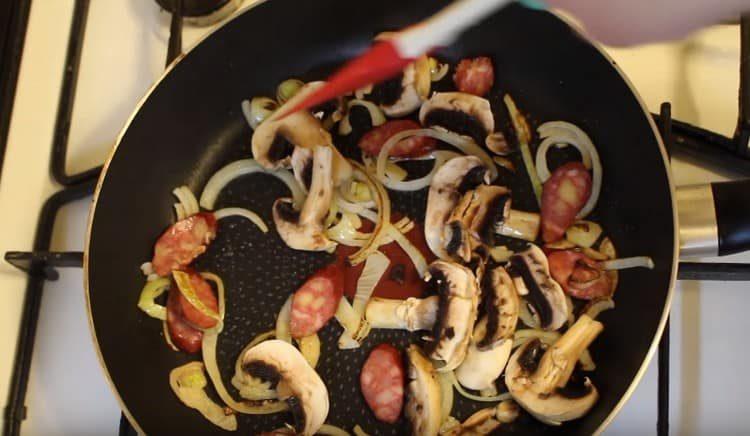 Fry sausages and mushrooms.