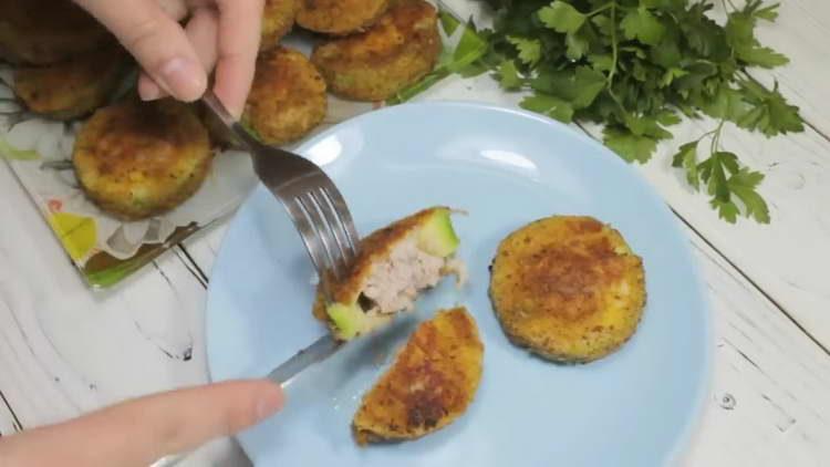 zucchini with minced meat in a pan