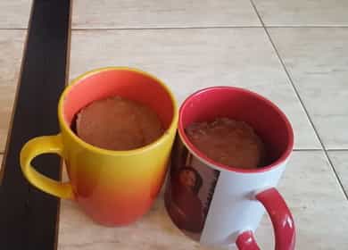 К Chocolate muffin in a microwave in a mug
