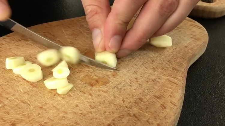 chop garlic cloves