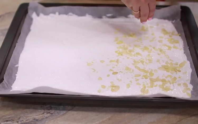 pour the dough onto a baking sheet