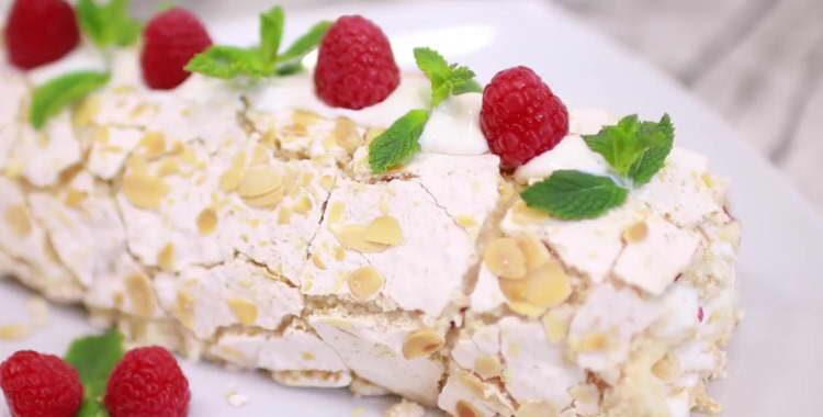 Chic икар meringue roll with raspberries, nuts and coconut