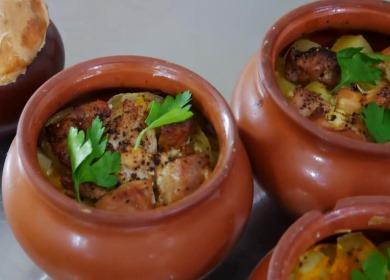 Tender meat in pots  with potatoes in the oven