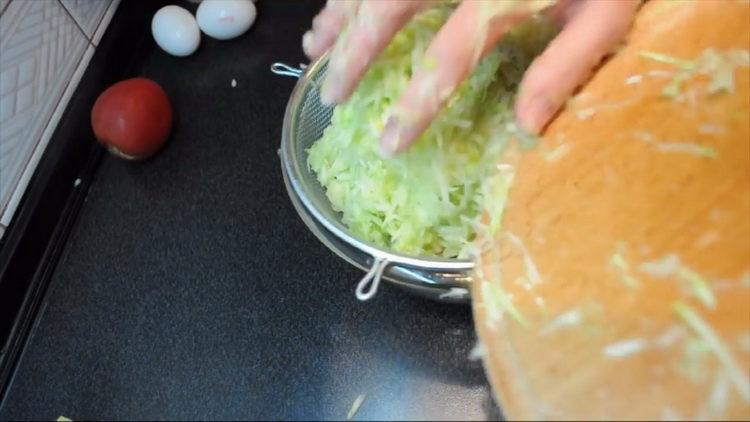 remove excess water from the zucchini