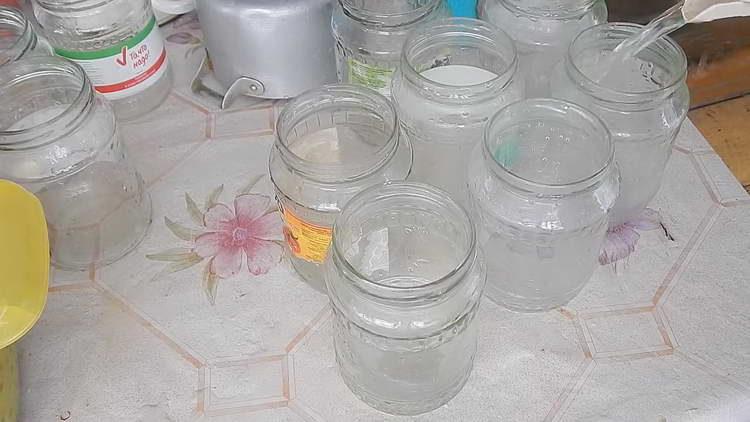 pour boiling water into jars