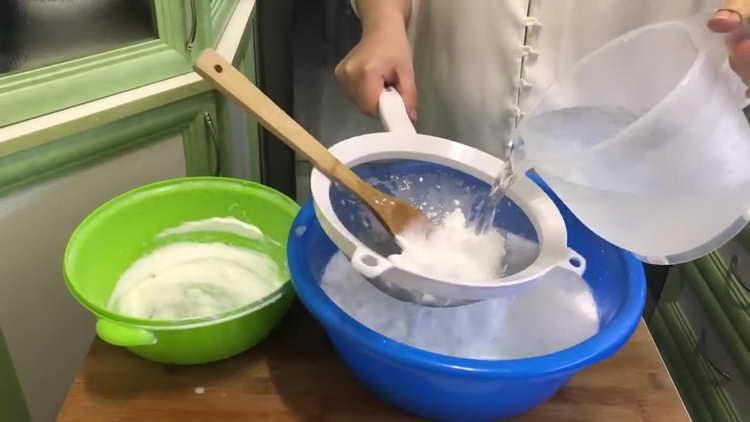 pour lime through a colander