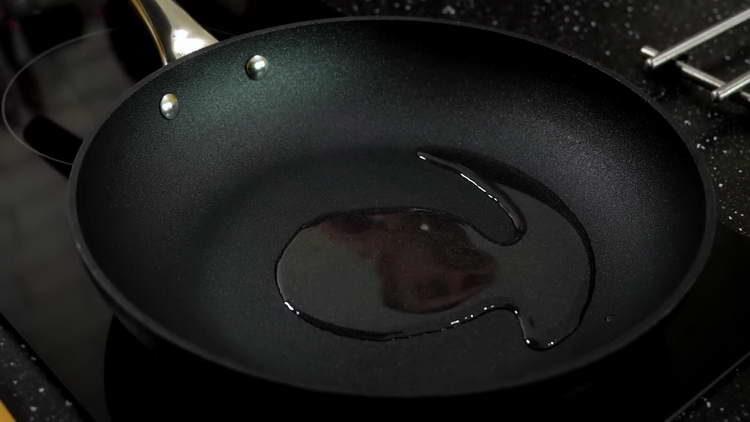 pour oil into the pan