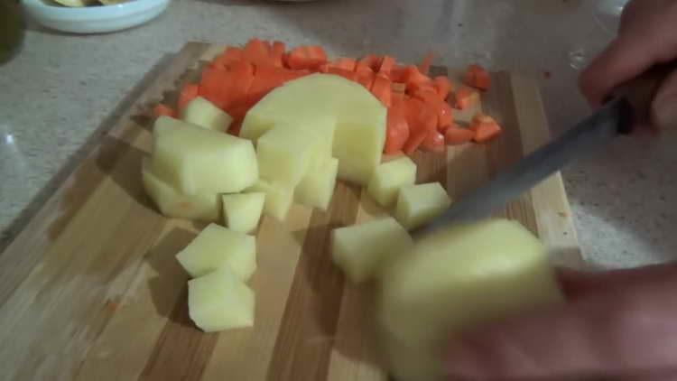 chop carrots and potatoes