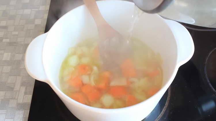 pour boiling water into vegetables