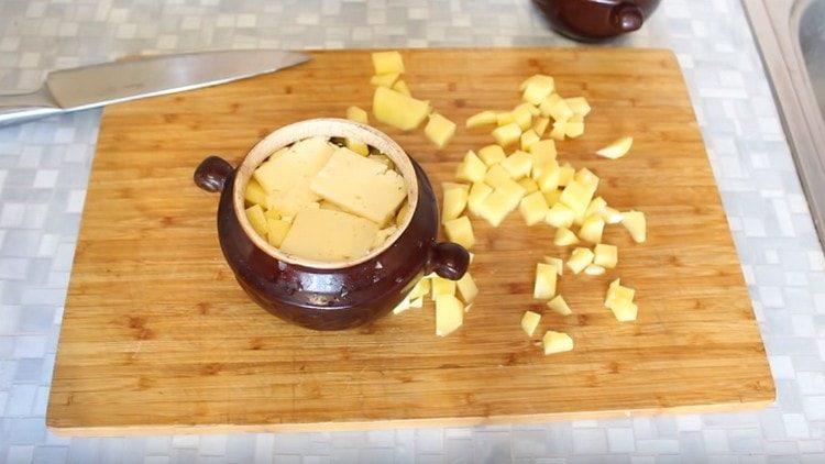 Add a few slices of cheese over the butter.