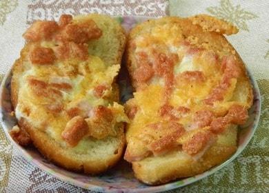 Tasty hot sandwiches  with sausage and cheese