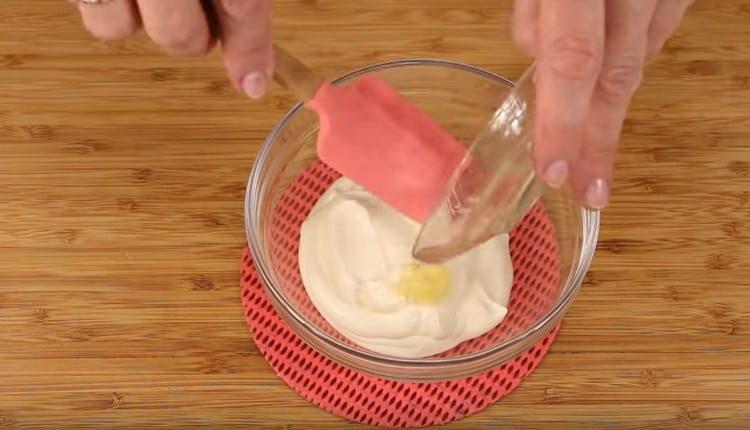 Mix mayonnaise with chopped garlic.