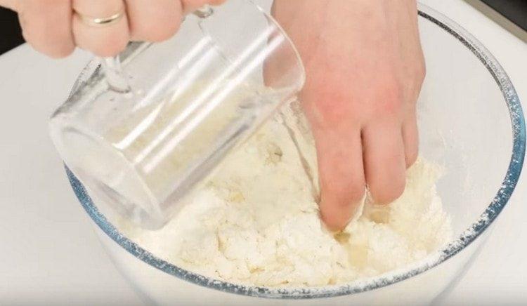Add water to the flour.